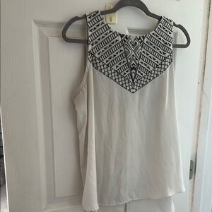 White Sleeveless Top with Black Pattern